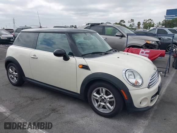 2013 MINI Hardtop with VIN WMWSU3C51DT687156, listed as a IAAI auction lot 42750063 with 93,002 mi miles and . Bid and sale history available at DreamBid. Image 1.