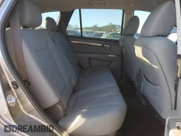 2012 Hyundai Santa Fe GLS z VIN 5XYZG3AB0CG122036, wystawiony jako Copart lot #76293294 z przebiegiem 182 407 mil mil oraz Czysty tytuł • Clean title. Historia ofert i sprzedaży dostępna na DreamBid. Obrazek 10.