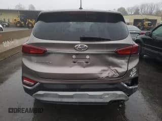 ✅ 2019 Hyundai Santa Fe SE • VIN: 5NMS2CAD1KH128322 • Lot: 73730493. Wystawiony na Copart z przebiegiem 41 785 mil. Bezpłatny archiwum sprzedaży aukcyjnych z USA i szczegółowy raport historii pojazdu na DreamBid. Zdjęcie 6.