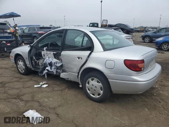 ✅ 2002 Saturn SL • VIN: 1G8ZH528X2Z158256 • Lot: 81481665. Wystawiony na Copart z przebiegiem 68 172 mil. Bezpłatny archiwum sprzedaży aukcyjnych z USA i szczegółowy raport historii pojazdu na DreamBid. Zdjęcie 2.