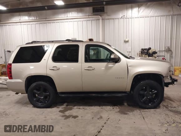 ✅ 2013 Chevrolet Tahoe LT • VIN: 1GNSKBE08DR215142 • Lot: 43665019. Listed on IAAI with 203,239 mi. Free auction sales archive from the USA and detailed vehicle history report at DreamBid. Image 14.