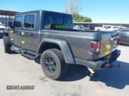 ✅ 2023 Jeep Gladiator Mojave • VIN: 1C6JJTEGXPL517914 • Lot: 43666074. Listed on IAAI with 33,445 mi. Free auction sales archive from the USA and detailed vehicle history report at DreamBid. Image 3.