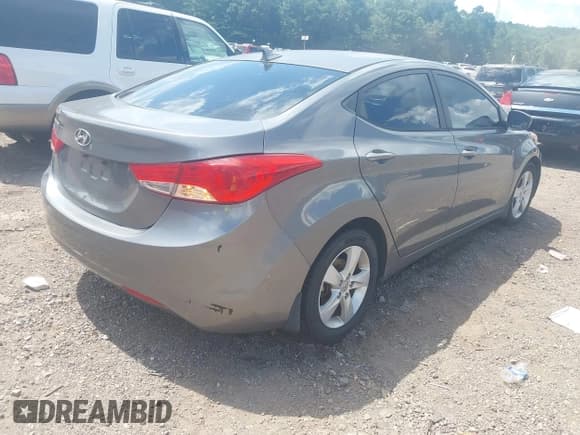 ✅ 2013 Hyundai Elantra GLS • VIN: 5NPDH4AE1DH223894 • Lot: 42718382. Listed on IAAI with 135,798 mi. Free auction sales archive from the USA and detailed vehicle history report at DreamBid. Image 4.