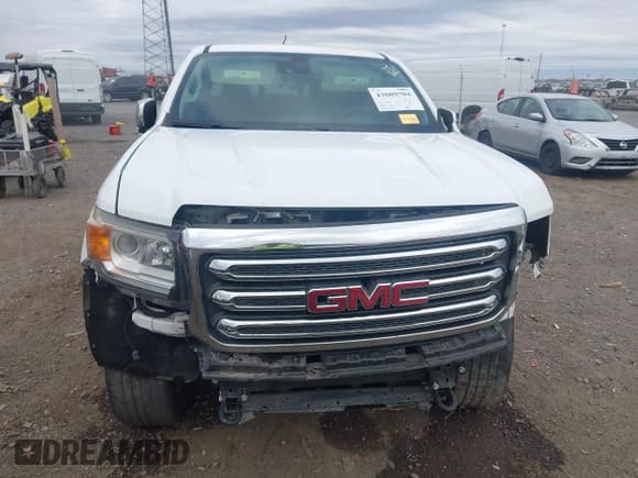 ✅ 2017 GMC Canyon 4WD SLT • VIN: 1GTG6DEN6H1249790 • Лот: 43609704. Опубликован ранее на IAAI с пробегом 141 693 миль. Бесплатный доступ к архиву аукционных продаж из США и подробный отчёт об истории автомобиля на DreamBid. Изображение 13.