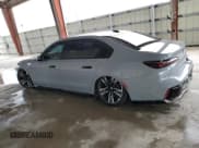 ✅ 2023 BMW i7 xDrive60 • VIN: WBY53EJ04PCM31425 • Лот: 59719113. Опубликован ранее на Copart с пробегом 5 414 миль. Бесплатный доступ к архиву аукционных продаж из США и подробный отчёт об истории автомобиля на DreamBid. Изображение 2.