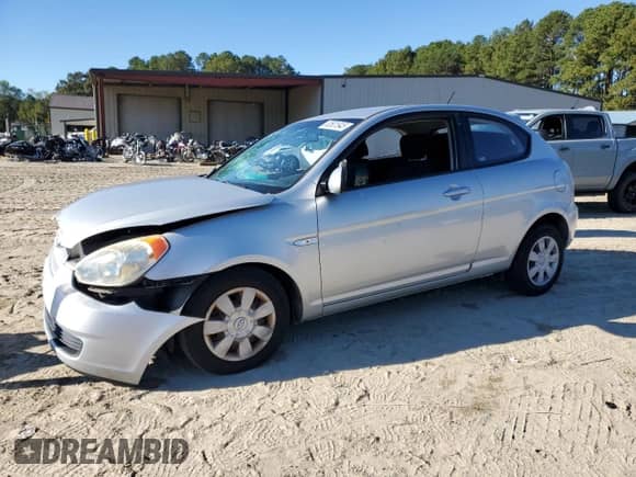 2007 Hyundai Accent GS with VIN KMHCM36C77U022368, listed as a Copart auction lot 82601945 with 150,964 mi miles and Salvage title. Bid and sale history available at DreamBid. Image 1.