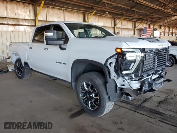 ✅ 2024 Chevrolet Silverado 2500HD LTZ • VIN: 2GC4YPE74R1143608 • Lot: 87422805. Listed on Copart with 40,480 mi. Free auction sales archive from the USA and detailed vehicle history report at DreamBid. Image 4.