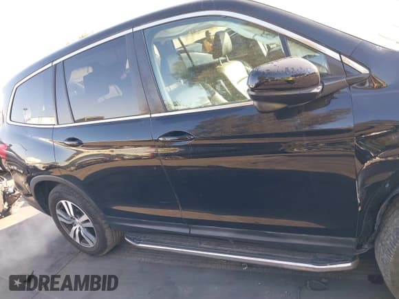 ✅ 2017 Honda Pilot EX-L • VIN: 5FNYF5H76HB009198 • Lot: 41360761. Listed on IAAI with 108,719 mi. Free auction sales archive from the USA and detailed vehicle history report at DreamBid. Image 14.