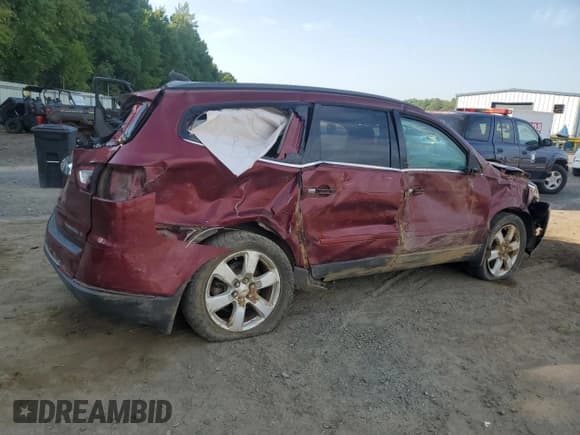✅ 2016 Chevrolet Traverse LT • VIN: 1GNKRGKDXGJ103302 • Lot: 70151535. Listed on Copart with 143,858 mi. Free auction sales archive from the USA and detailed vehicle history report at DreamBid. Image 3.