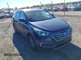 ✅ 2018 Hyundai Santa Fe 2.4L • VIN: 5XYZT3LB2JG568338 • Лот: 43601239. Опубликован ранее на IAAI с пробегом 119 845 миль. Бесплатный доступ к архиву аукционных продаж из США и подробный отчёт об истории автомобиля на DreamBid. Изображение 1.