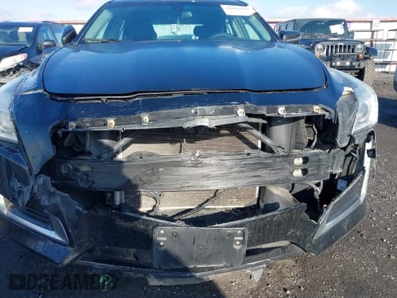 ✅ 2014 Cadillac CTS AWD • VIN: 1G6AW5SX1E0159081 • Lot: 43656547. Listed on IAAI with 105,828 mi. Free auction sales archive from the USA and detailed vehicle history report at DreamBid. Image 6.