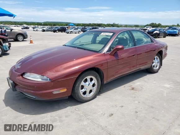 ✅ 1999 Oldsmobile Aurora • VIN: 1G3GR62C0X4109351 • Lot: 66501485. Listed on Copart with 83,131 mi. Free auction sales archive from the USA and detailed vehicle history report at DreamBid. Image 1.