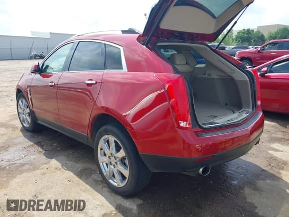 ✅ 2012 Cadillac SRX Premium Collection • VIN: 3GYFNCE38CS591279 • Lot: 42301054. Wystawiony na IAAI z przebiegiem 118 493 mil. Bezpłatny archiwum sprzedaży aukcyjnych z USA i szczegółowy raport historii pojazdu na DreamBid. Zdjęcie 3.