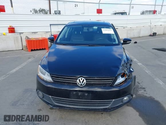 ✅ 2014 Volkswagen Jetta TDI w/Premium/Nav • VIN: 3VWLL7AJ3EM404934 • Lot: 42809693. Listed on IAAI with 142,331 mi. Free auction sales archive from the USA and detailed vehicle history report at DreamBid. Image 12.