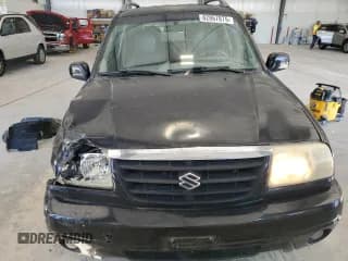 ✅ 2001 Suzuki Grand Vitara JLX • VIN: JS3TD62V414155806 • Лот: 62867875. Опубликован ранее на Copart с пробегом 173 333 миль. Бесплатный доступ к архиву аукционных продаж из США и подробный отчёт об истории автомобиля на DreamBid. Изображение 5.