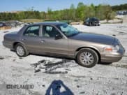 ✅ 2005 Ford Crown Victoria LX • VIN: 2FAFP74WX5X166506 • Lot: 52141265. Listed on Copart with 117,686 mi. Free auction sales archive from the USA and detailed vehicle history report at DreamBid. Image 4.