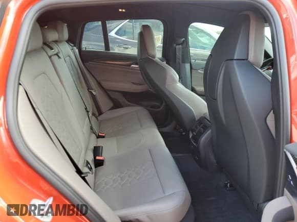 ✅ 2021 BMW X4 M • VIN: 5YMUJ0C05M9F82571 • Lot: 77874784. Listed on Copart with 14,576 mi. Free auction sales archive from the USA and detailed vehicle history report at DreamBid. Image 11.