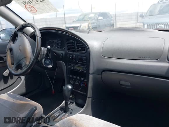 ✅ 2001 Kia Spectra GS • VIN: KNAFB161015032068 • Лот: 42474681. Опубликован ранее на IAAI с пробегом 177 465 миль. Бесплатный доступ к архиву аукционных продаж из США и подробный отчёт об истории автомобиля на DreamBid. Изображение 5.