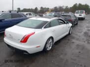 ✅ 2017 Jaguar XJ Portfolio • VIN: SAJWA2G73H8W04310 • Lot: 40914491. Listed on IAAI with 62,102 mi. Free auction sales archive from the USA and detailed vehicle history report at DreamBid. Image 4.