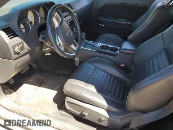 2012 Dodge Challenger SXT z VIN 2C3CDYAG4CH153576, wystawiony jako Copart lot #71494414 z przebiegiem 139 650 mil mil oraz Szkoda całkowita • Salvage title. Historia ofert i sprzedaży dostępna na DreamBid. Obrazek 7.