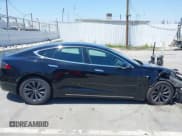 ✅ 2019 Tesla Model S 75D • VIN: 5YJSA1E22KF304098 • Lot: 42293794. Listed on IAAI with 49,545 mi. Free auction sales archive from the USA and detailed vehicle history report at DreamBid. Image 13.