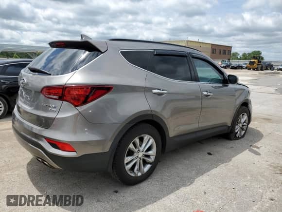 2017 Hyundai Santa Fe 2.0T z VIN 5XYZUDLA9HG437458, wystawiony jako Copart lot #57751415 z przebiegiem 117 469 mil mil oraz Szkoda całkowita • Salvage title. Historia ofert i sprzedaży dostępna na DreamBid. Obrazek 3.