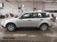 ✅ 2009 Subaru Forester X • VIN: JF2SH61649H772721 • Lot: 42572897. Listed on IAAI with 153,255 mi. Free auction sales archive from the USA and detailed vehicle history report at DreamBid. Image 12.