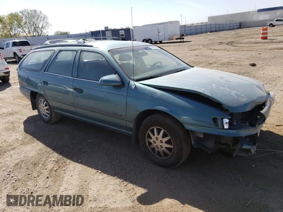 ✅ 1993 Ford Taurus • VIN: 1FACP5746PA162644 • Lot: 74177004. Listed on Copart with 37,125 mi. Free auction sales archive from the USA and detailed vehicle history report at DreamBid. Image 4.