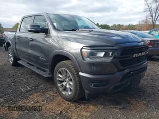✅ 2021 Ram 1500 Laramie • VIN: 1C6SRFJTXMN777022 • Lot: 43696698. Listed on IAAI with 88,663 mi. Free auction sales archive from the USA and detailed vehicle history report at DreamBid. Image 1.