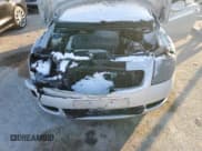 ✅ 2003 Audi TT • VIN: TRUWT28N231003094 • Lot: 83226404. Listed on Copart with 127,470 mi. Free auction sales archive from the USA and detailed vehicle history report at DreamBid. Image 13.