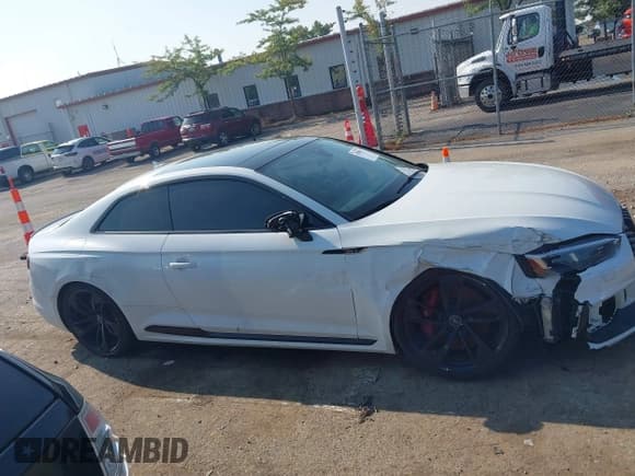 ✅ 2018 Audi RS 5 • VIN: WUAPWAF54JA902140 • Lot: 42996212. Listed on IAAI with 58,697 mi. Free auction sales archive from the USA and detailed vehicle history report at DreamBid. Image 13.