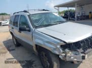 ✅ 2004 Jeep Grand Cherokee Laredo • VIN: 1J4GX48S74C165095 • Lot: 42306475. Listed on IAAI with 238,560 mi. Free auction sales archive from the USA and detailed vehicle history report at DreamBid. Image 1.