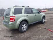 ✅ 2008 Ford Escape XLT • VIN: 1FMCU03ZX8KE22199 • Lot: 43777230. Listed on IAAI with 124,306 mi. Free auction sales archive from the USA and detailed vehicle history report at DreamBid. Image 4.
