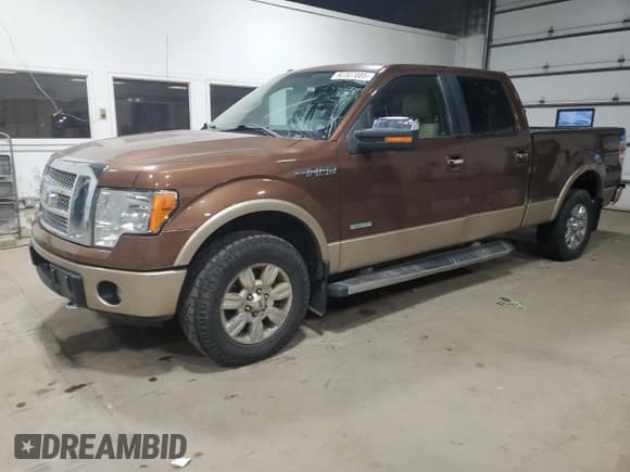 ✅ 2012 Ford F-150 Lariat • VIN: 1FTFW1ET5CFB15566 • Lot: 92307085. Listed on Copart with 143,359 mi. Free auction sales archive from the USA and detailed vehicle history report at DreamBid. Image 1.