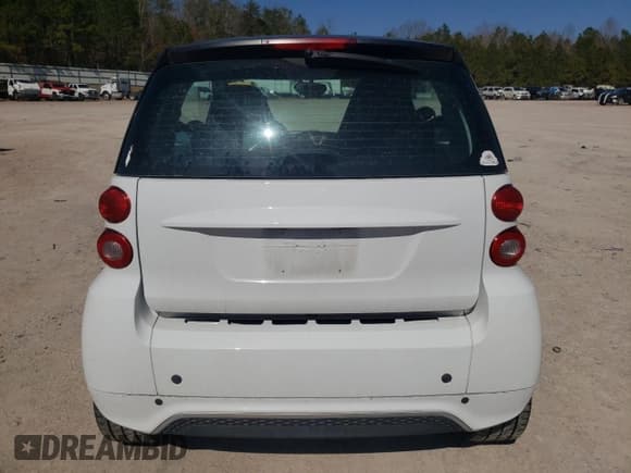 ✅ 2014 Smart fortwo Pure • VIN: WMEEJ3BA0EK780282 • Lot: 47691815. Wystawiony na Copart z przebiegiem 74 144 mil. Bezpłatny archiwum sprzedaży aukcyjnych z USA i szczegółowy raport historii pojazdu na DreamBid. Zdjęcie 6.