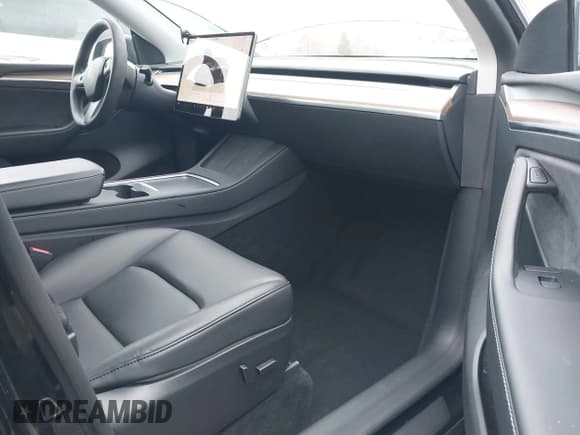 ✅ 2023 Tesla Model Y Long Range • VIN: 7SAYGAEE2PF905136 • Lot: 41572597. Listed on IAAI with 33,425 mi. Free auction sales archive from the USA and detailed vehicle history report at DreamBid. Image 5.