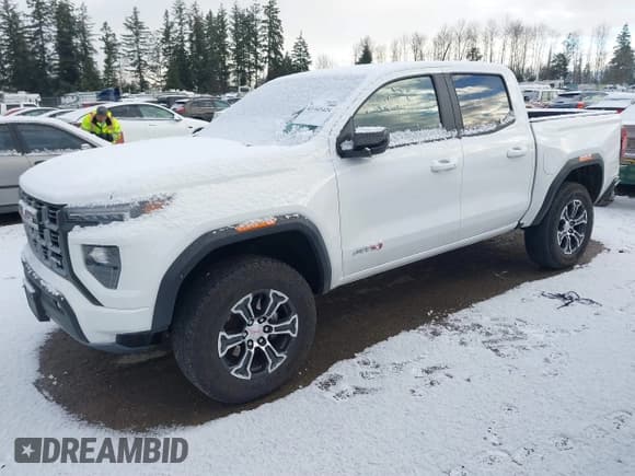 ✅ 2023 GMC Canyon 4WD AT4 • VIN: 1GTP6DEK4P1263112 • Lot: 41445424. Listed on IAAI with 27,260 mi. Free auction sales archive from the USA and detailed vehicle history report at DreamBid. Image 2.