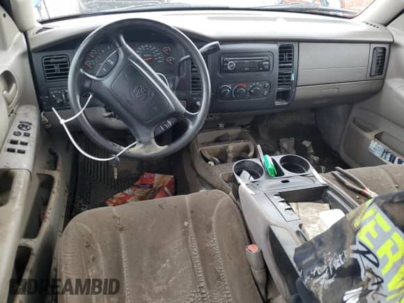 2004 Dodge Dakota SLT z VIN 1D7HG48N04S695750, wystawiony jako Copart lot #61059154 z przebiegiem Nie podano mil oraz Szkoda całkowita • Salvage title. Historia ofert i sprzedaży dostępna na DreamBid. Obrazek 8.