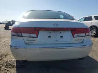 2006 Hyundai Azera SE с VIN KMHFC46F26A136584, выставлен на аукционе Copart как лот 49860275 с пробегом 224 972 миль миль и Списание • Salvage title. История ставок и продаж доступна на DreamBid. Изображение 6.