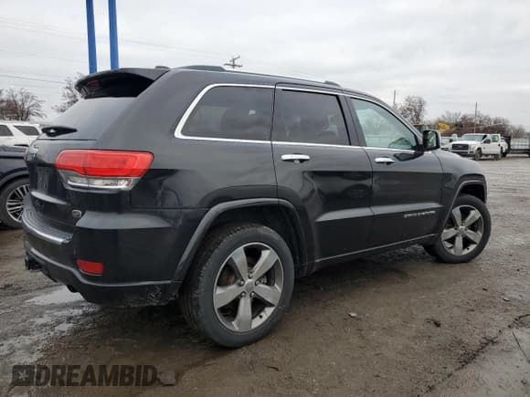 ✅ 2015 Jeep Grand Cherokee Overland • VIN: 1C4RJFCM5FC847707 • Lot: 86420784. Listed on Copart with 124,300 mi. Free auction sales archive from the USA and detailed vehicle history report at DreamBid. Image 3.