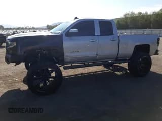 ✅ 2016 Chevrolet Silverado 1500 LT • VIN: 1GCRCREC3GZ413011 • Лот: 65388364. Опубликован ранее на Copart с пробегом 140 346 миль. Бесплатный доступ к архиву аукционных продаж из США и подробный отчёт об истории автомобиля на DreamBid. Изображение 1.
