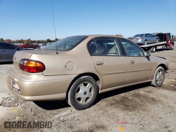 2001 Chevrolet Malibu LS with VIN 1G1NE52J516247046, listed as a Copart auction lot 77323744 with 196,580 mi miles and Salvage title. Bid and sale history available at DreamBid. Image 3.