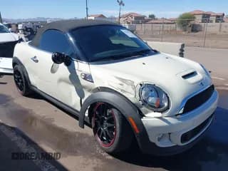 ✅ 2015 MINI Roadster S • VIN: WMWSY3C51FT595455 • Lot: 41670221. Listed on IAAI with 24,680 mi. Free auction sales archive from the USA and detailed vehicle history report at DreamBid. Image 1.