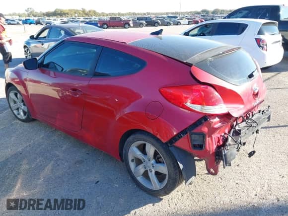 2013 Hyundai Veloster w/Black Int с VIN KMHTC6AD9DU093846, выставлен на аукционе IAAI как лот 43617895 с пробегом 179 710 миль миль и . История ставок и продаж доступна на DreamBid. Изображение 3.