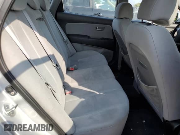 2009 Hyundai Elantra GLS z VIN KMHDU46D49U783607, wystawiony jako Copart lot #68806944 z przebiegiem 107 376 mil mil oraz Szkoda całkowita • Salvage title. Historia ofert i sprzedaży dostępna na DreamBid. Obrazek 10.