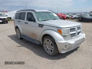 ✅ 2007 Dodge Nitro R/T • VIN: 1D8GU58657W724820 • Lot: 42993207. Listed on IAAI with 174,862 mi. Free auction sales archive from the USA and detailed vehicle history report at DreamBid. Image 1.