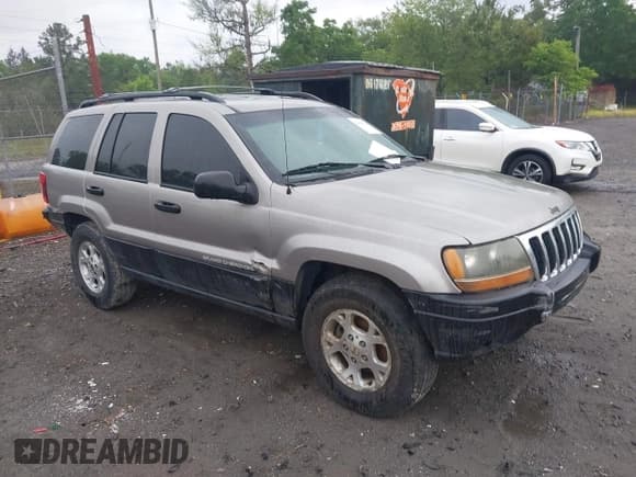 ✅ 1999 Jeep Grand Cherokee Laredo • VIN: 1J4G258SXXC518647 • Лот: 42124724. Опубликован ранее на IAAI с пробегом 229 668 миль. Бесплатный доступ к архиву аукционных продаж из США и подробный отчёт об истории автомобиля на DreamBid. Изображение 1.