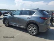 ✅ 2022 Mazda CX-5 Signature • VIN: JM3KFBXY0N0600644 • Лот: 65390865. Опубликован ранее на Copart с пробегом 39 783 миль. Бесплатный доступ к архиву аукционных продаж из США и подробный отчёт об истории автомобиля на DreamBid. Изображение 2.