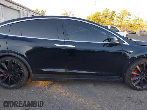 ✅ 2020 Tesla Model X Performance • VIN: 5YJXCAE43LF233836 • Lot: 41067464. Listed on IAAI with 69,231 mi. Free auction sales archive from the USA and detailed vehicle history report at DreamBid. Image 14.