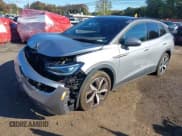 ✅ 2023 Volkswagen ID.4 Pro • VIN: 1V2VMPE81PC031217 • Лот: 43418328. Опубликован ранее на IAAI с пробегом 19 387 миль. Бесплатный доступ к архиву аукционных продаж из США и подробный отчёт об истории автомобиля на DreamBid. Изображение 21.